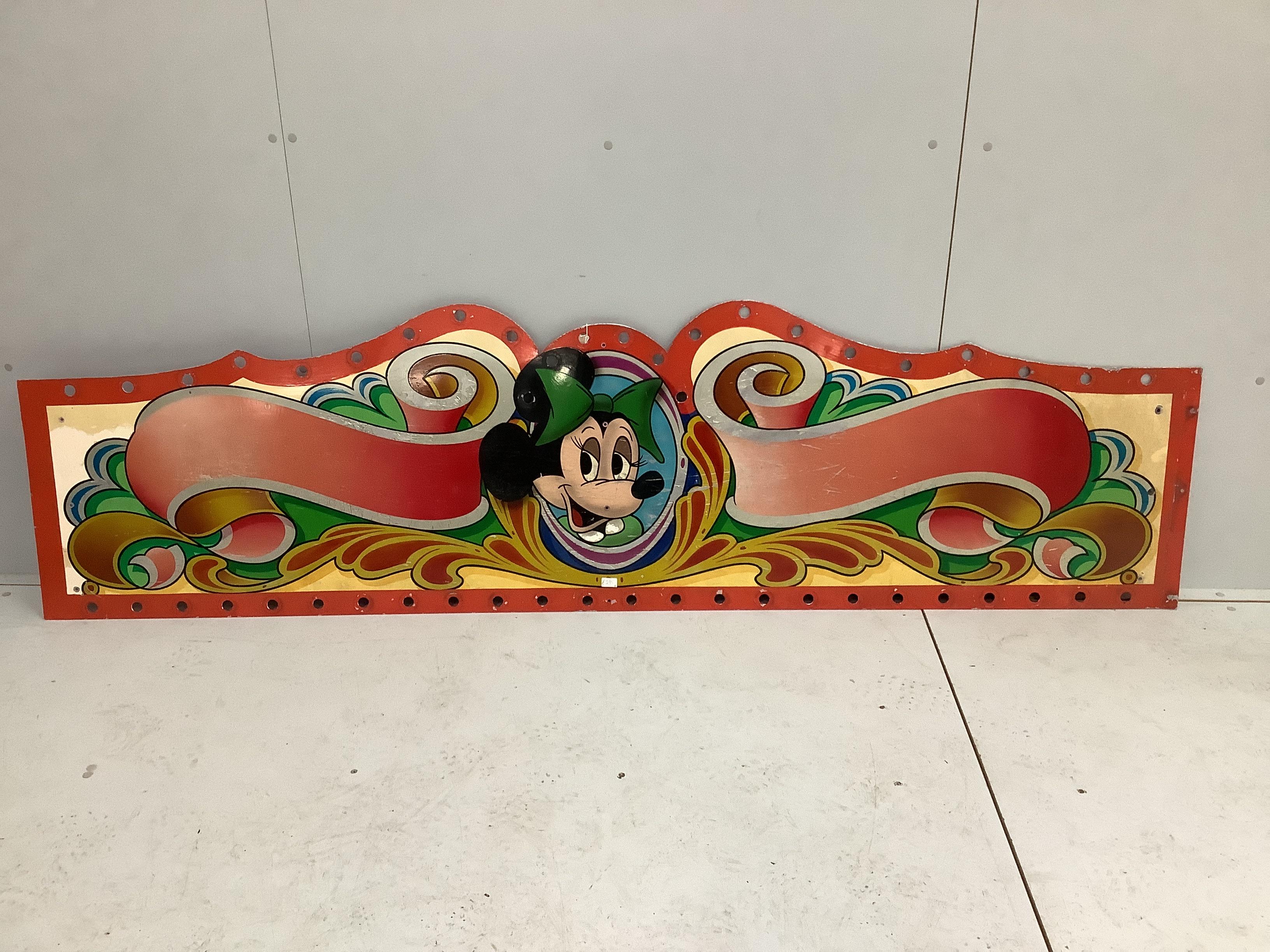 A vintage painted metal 'Minnie Mouse' fairground panel, width 226cm, height 62cm